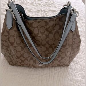 Coach signature monogram bag.